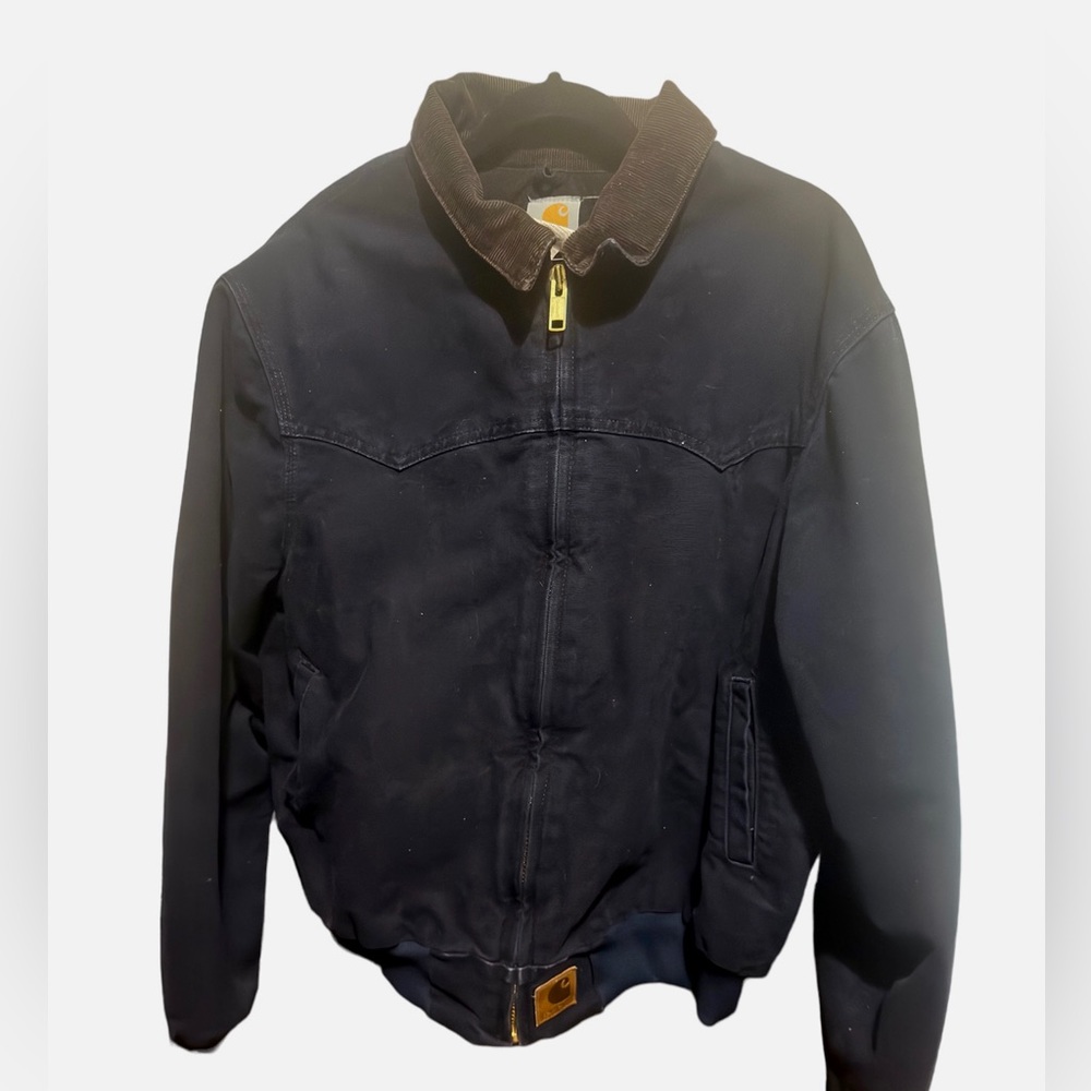 Carhart jacket could be women’s large or XL.